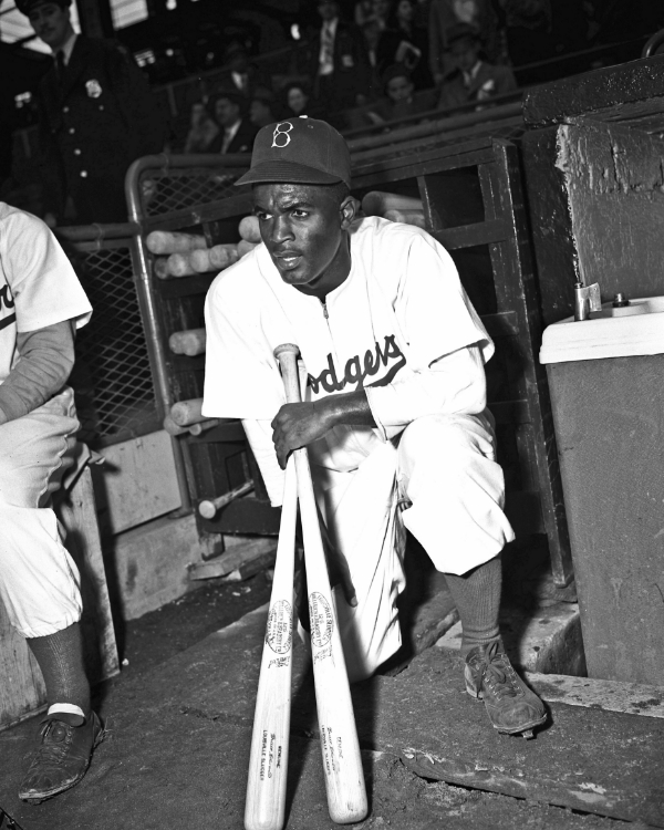 jackie robinson holding a bat