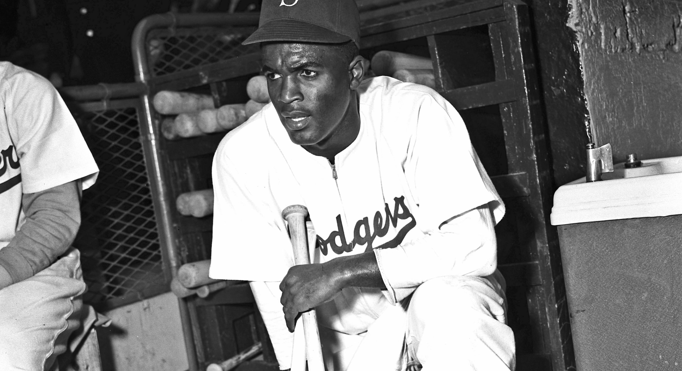 jackie robinson holding a bat